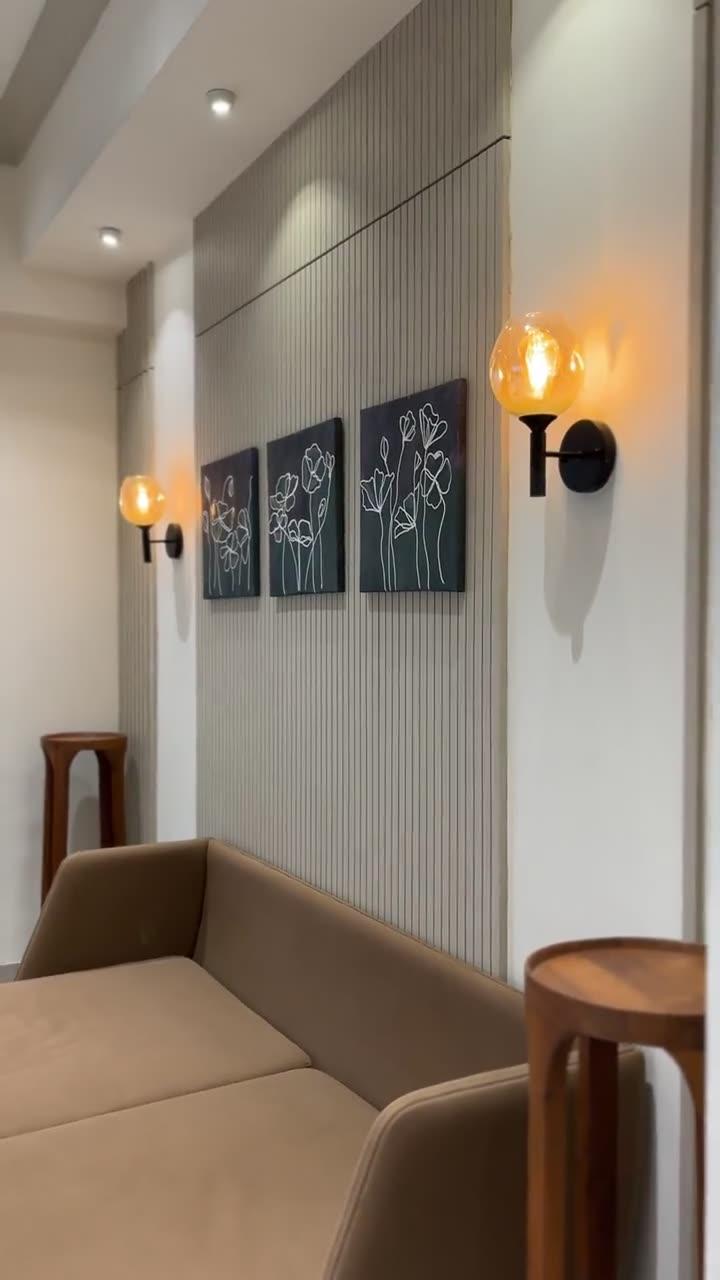 Formal Lounge — Sconces & Canvases